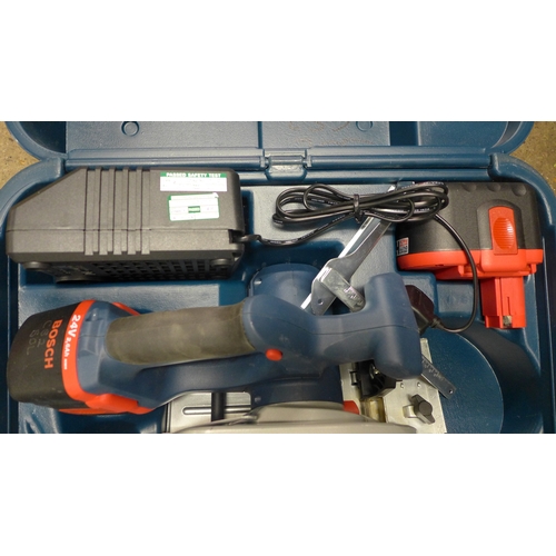 2413 - A Bosch GKS 24v cordless circular saw with two 24v batteries, charger and case