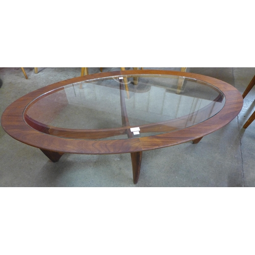 16 - A G-Plan Astro teak and glass topped oval coffee table