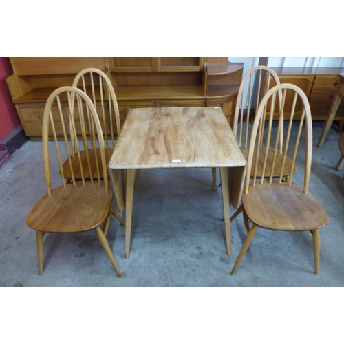 17 - An Ercol elm and beech Windsor drop-leaf table and four Quaker chairs