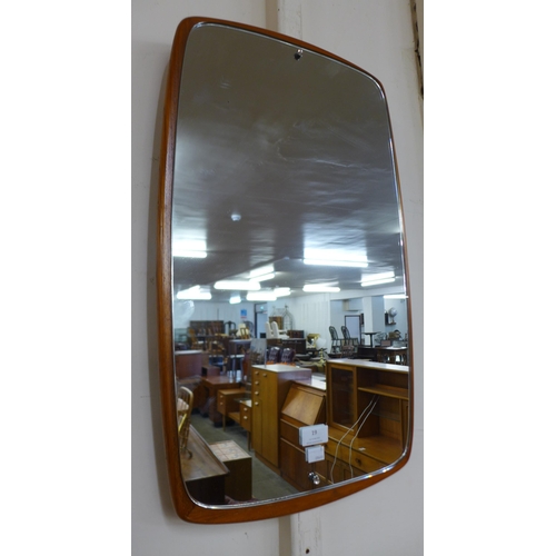 19 - A teak framed mirror