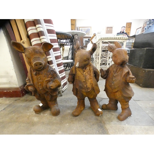 277 - A set of three cast iron Beatrix Potter garden figures