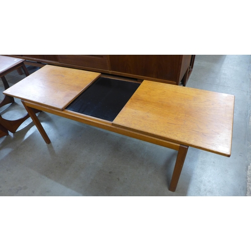 31 - A McIntosh teak extending coffee table