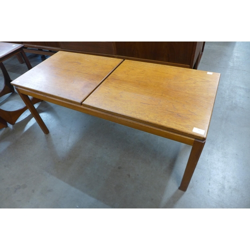 31 - A McIntosh teak extending coffee table