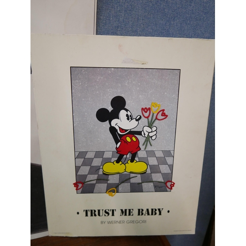 312B - Two prints, Clint Eastwood, no. 19/150 and Mickey Mouse, unframed