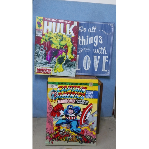 318 - Two Marvel canvas prints and one other