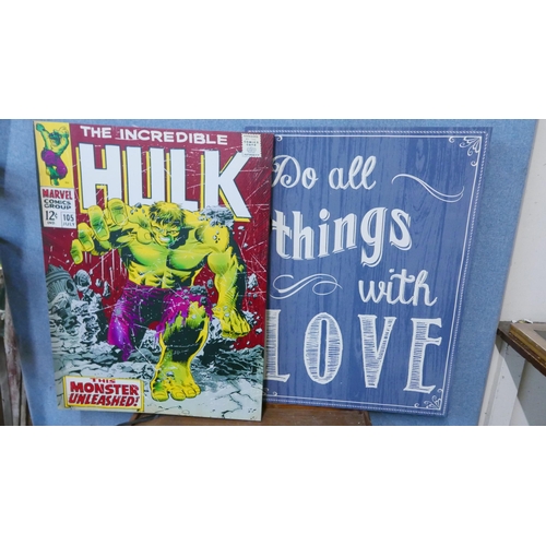 318 - Two Marvel canvas prints and one other