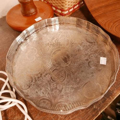 339 - A teak fruit bowl, a teak table lamp, a wicker sewing basket and a plated salver