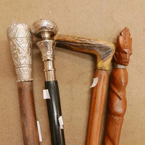 347 - Four assorted walking canes