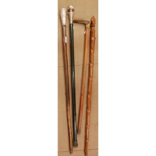 347 - Four assorted walking canes