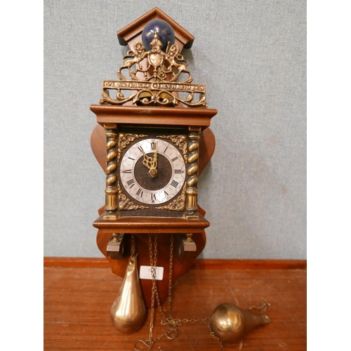 358 - A Dutch mahogany and brass wall clock