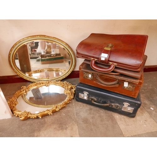 361 - Two gilt framed mirrors and vintage cases