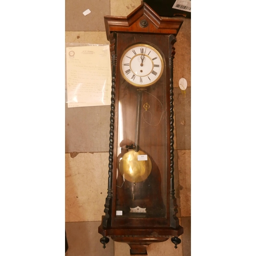 368 - A 19th Century walnut Vienna wall clock (lacking weights)