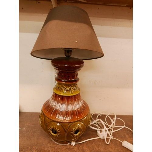 377 - A West German brown and green glazed table lamp