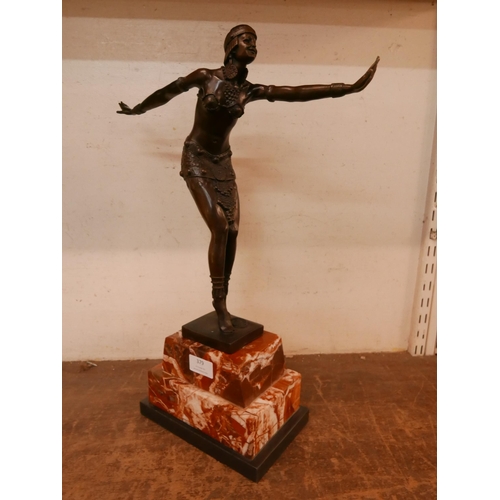 379 - An Art Deco bronze picture of an exotic dancer, on large marble socle