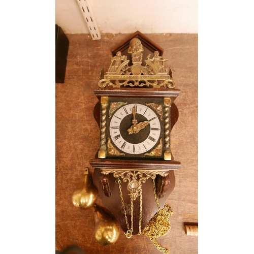 382 - A Dutch mahogany and brass wall clock