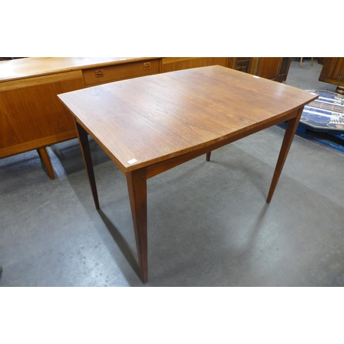 43 - A Lebus teak extending dining table