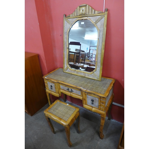 46 - An Italian style bamboo and rattan desk, mirror and occasional table