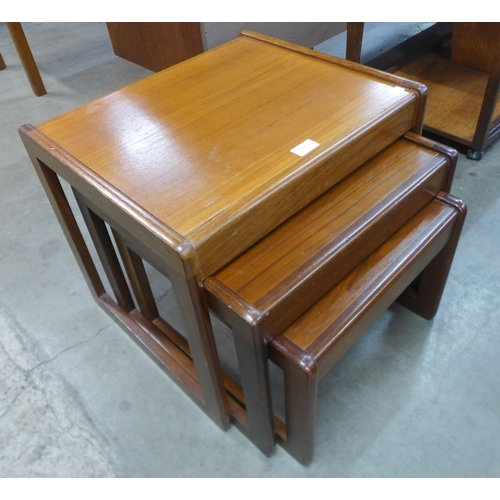 63 - A teak nest of tables