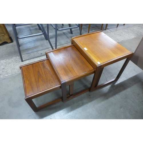 63 - A teak nest of tables