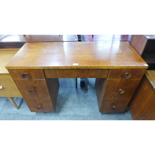 73 - An oak desk