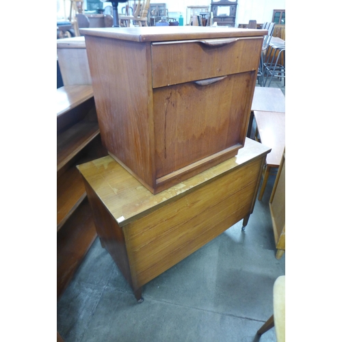 74 - A teak open bookcase, a bedside cabinet and a blanket box