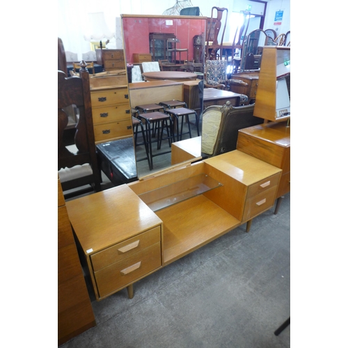 76 - A Stag Concord oak dressing table, designed by John & Sylvia Reid