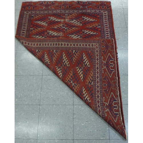 80 - An eastern Tekke Turkoman tight hand knotted antique rug, 166 x 109cms