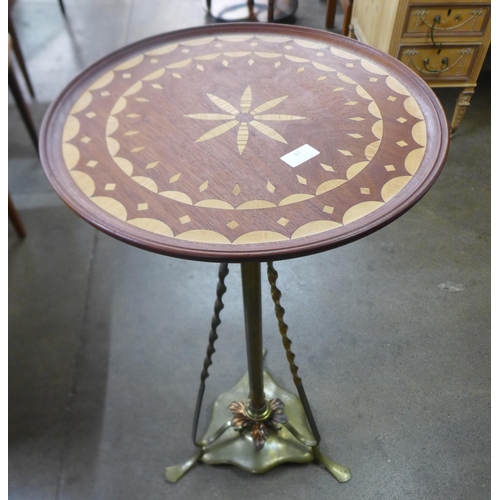 82 - A Victorian Aesthetic Movement occasional table, on copper and brass stand