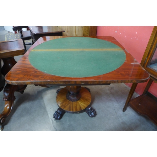 94 - A George IV mahogany D-shaped fold-over pedestal games table