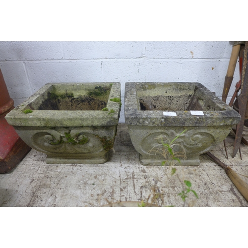 2255 - A pair of square stone planters