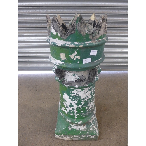 2262 - A green painted chimney pot