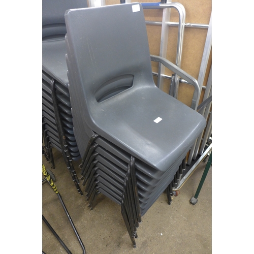 2277 - A set of 31 stackable plastic chairs with steel legs