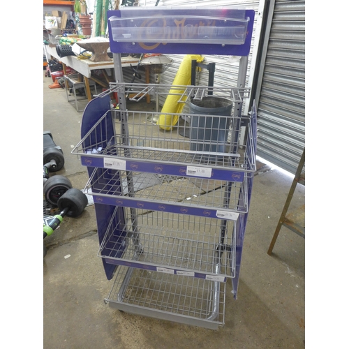 2291 - A Cadbury's shop display stand and metal racking bay