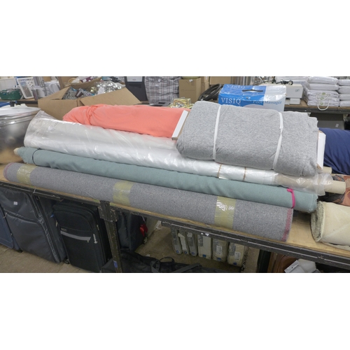 2308 - A large quantity of fabrics inc variety of patterns, colours and styles