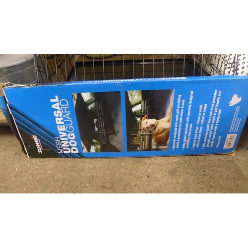 2415 - A in car dog crate, car dog guard and Doggie Dooley dog waste disposal system