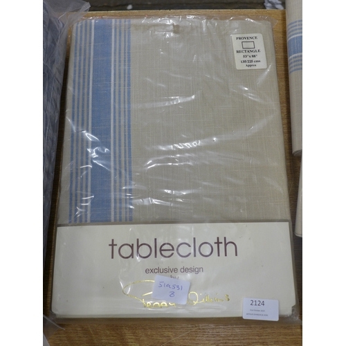 2124 - A Peggy Wilkins tablecloth and napkins and a pair of Curting fully lined luxury curtains