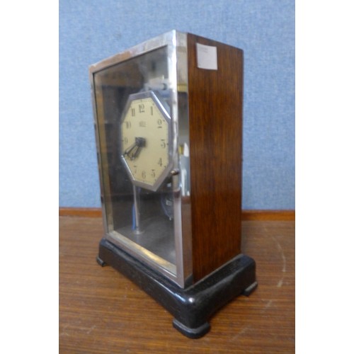 331 - An Art Deco Bulle oak and chrome cased electric mantel clock