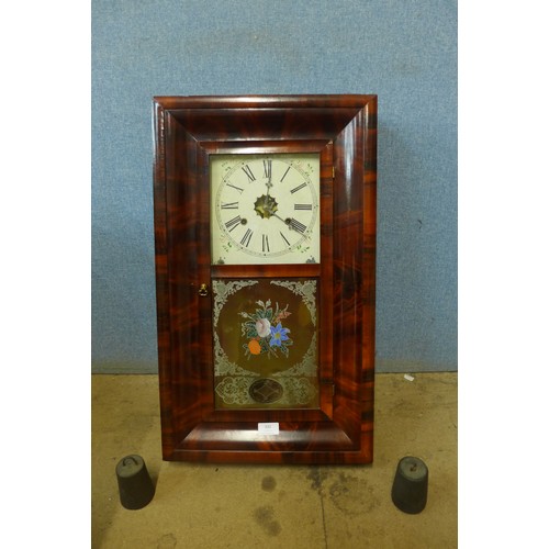 332 - A 19th Century American mahogany ogee cased wall clock