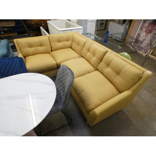 1997 - An ochre upholstered corner sofa