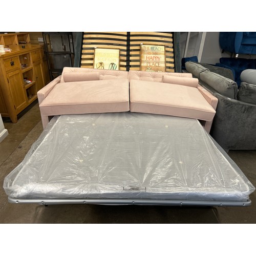 1351 - A pink velvet metal action oversized sofa bed