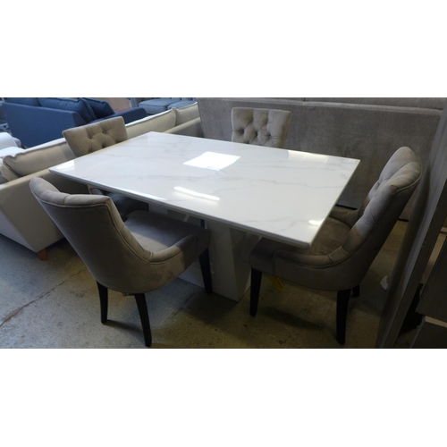 1357 - A marble effect dining table and four velvet chairs