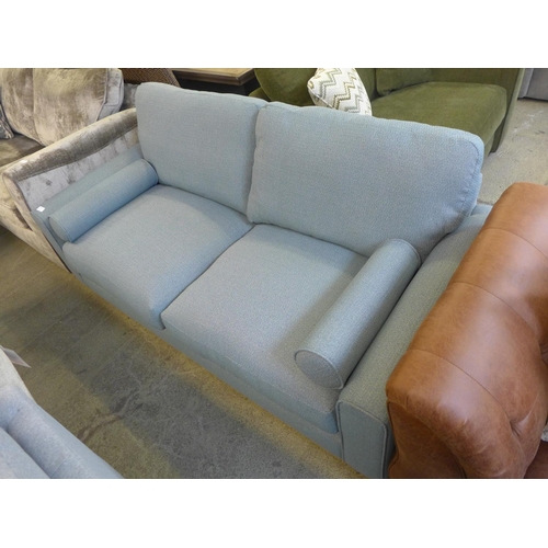 1440 - A duck egg blue upholstered three seater sofa