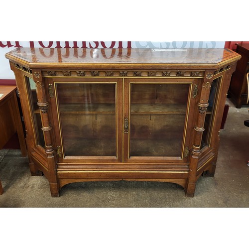 84 - A Victorian Gothic Revival inlaid walnut, burr walnut and parcel gilt two door side cabinet, attribu... 