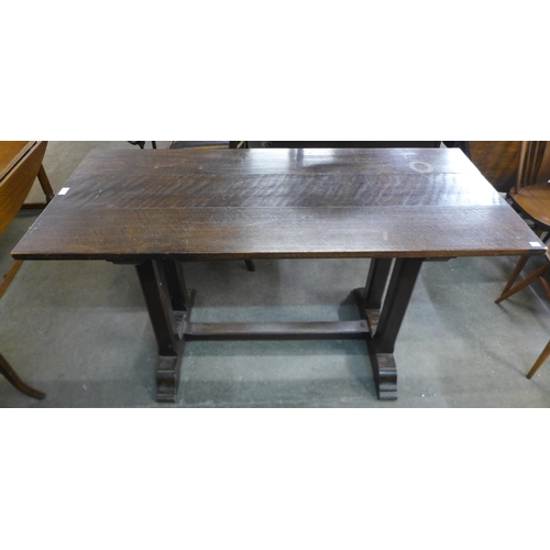 109 - An Arts and Crafts oak refectory table