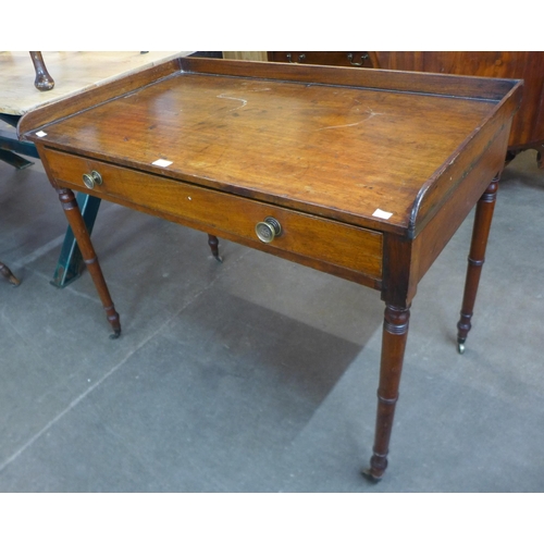 110 - A George IV mahogany single drawer writing table