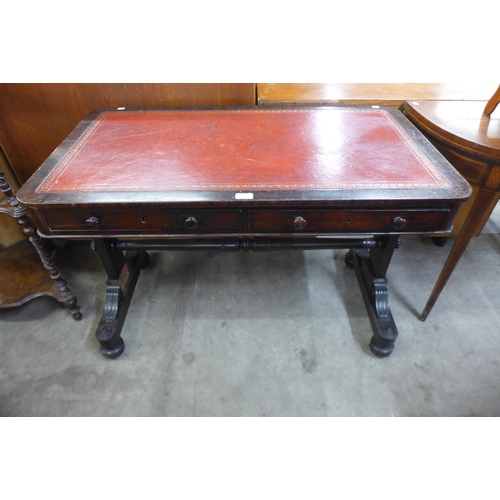 149 - A William IV mahogany and red leather topped two drawer writing table