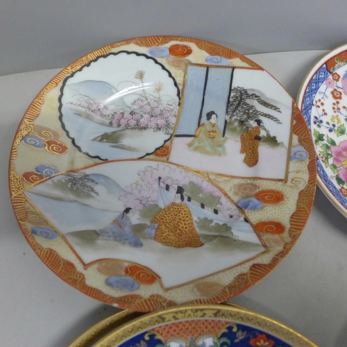 1083 - A collection of Oriental plates, a saucer and a Japanese vase **PLEASE NOTE THIS LOT IS NOT ELIGIBLE... 