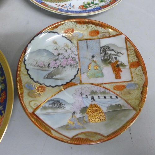 1083 - A collection of Oriental plates, a saucer and a Japanese vase **PLEASE NOTE THIS LOT IS NOT ELIGIBLE... 