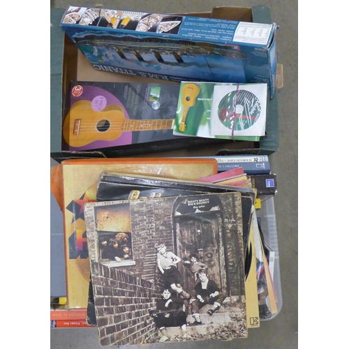 1135 - A Revell R.M.S. Titanic model, a ukelele, LP records and a collection of books (2 boxes) **PLEASE NO... 