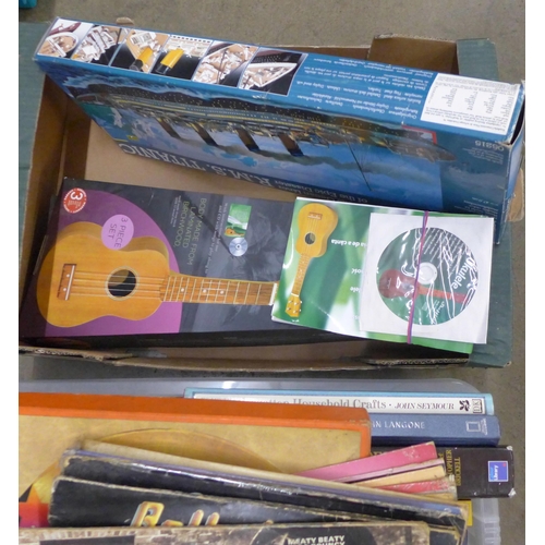 1135 - A Revell R.M.S. Titanic model, a ukelele, LP records and a collection of books (2 boxes) **PLEASE NO... 